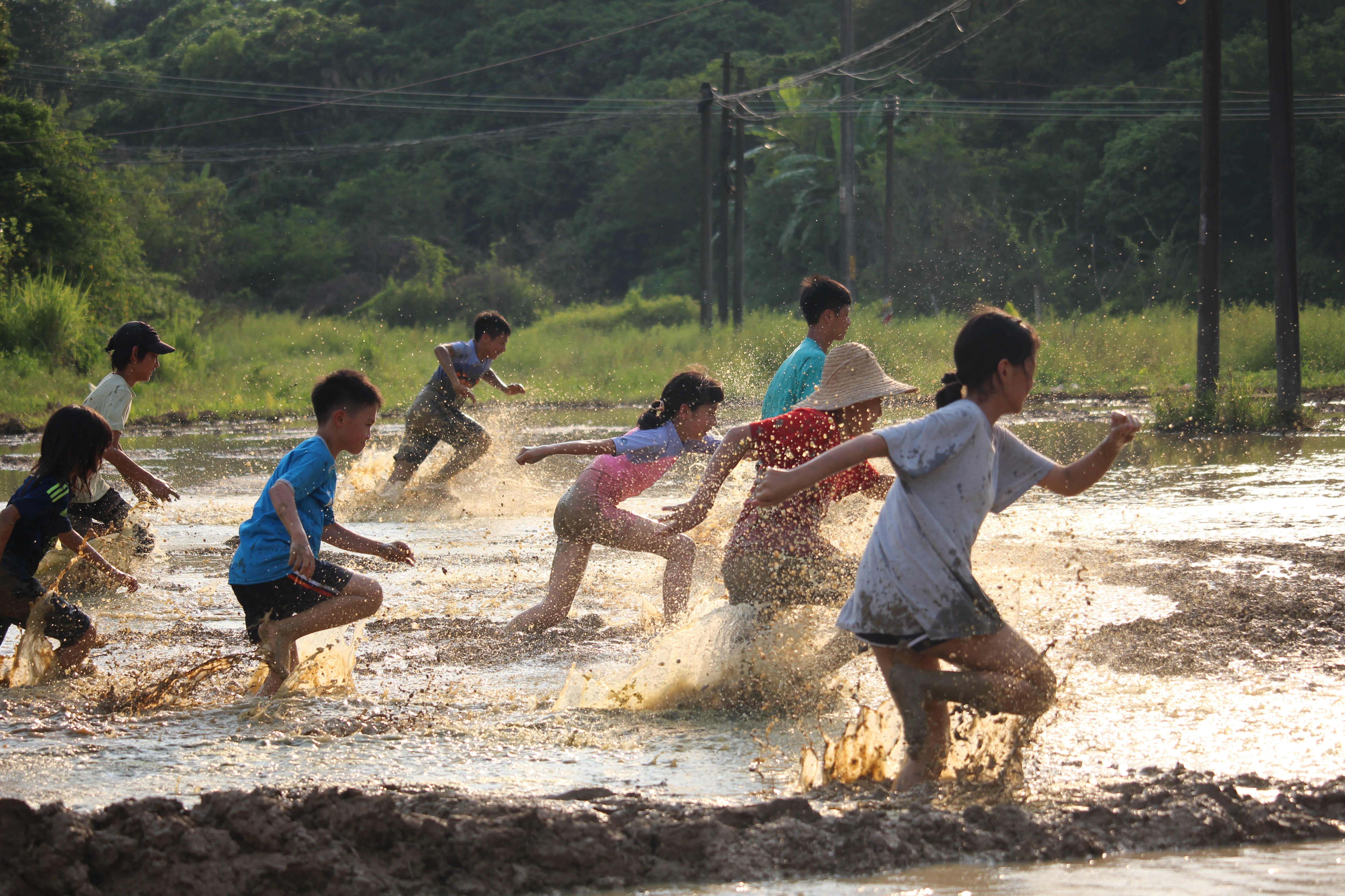 kids running in the water